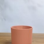 أصيص مخطط دائري متعدد الالوان 9 سم